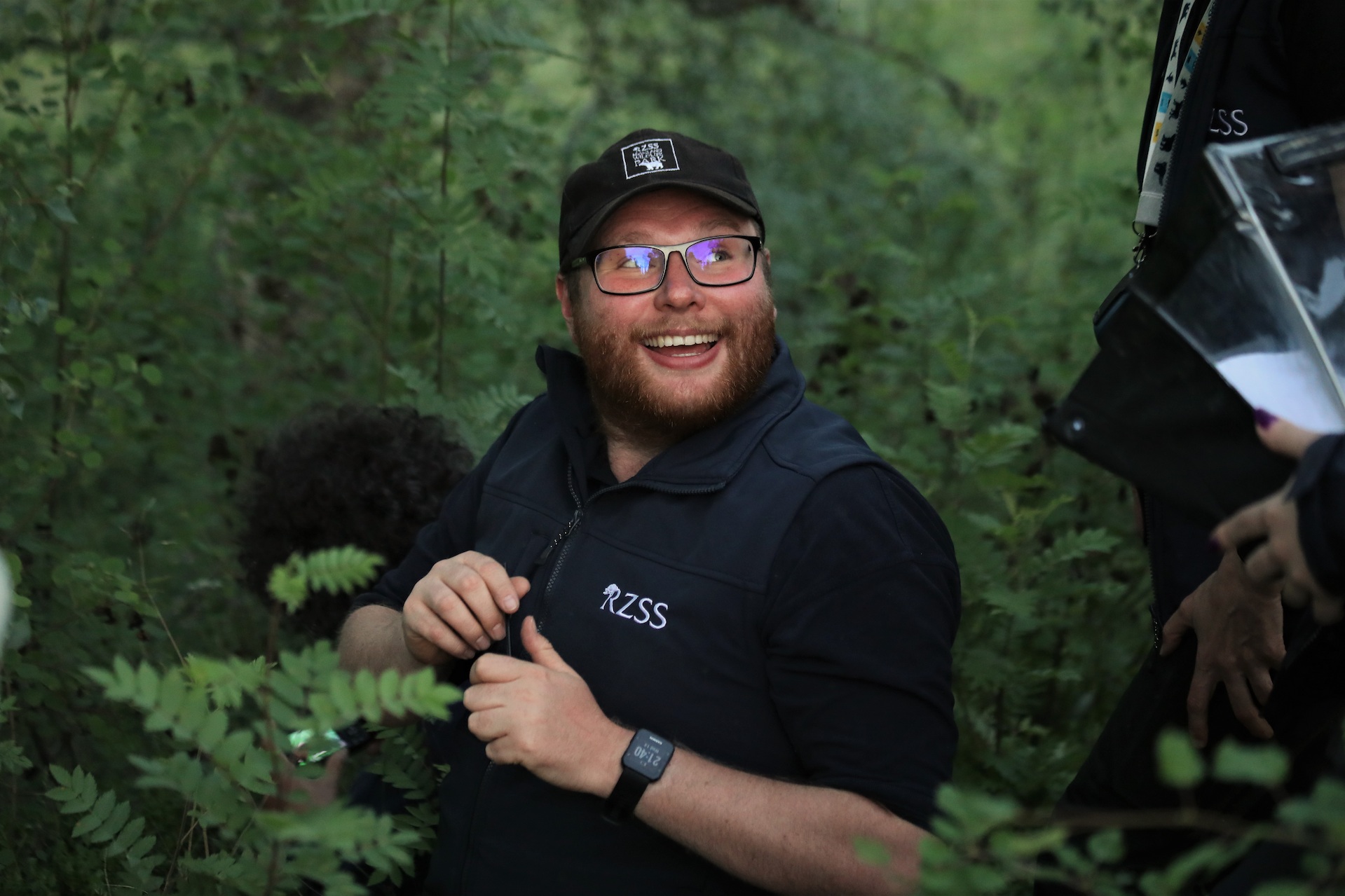 Adam Button at dark bordered beauty moth releases looking up smiling

Image: JESS WISE 2023