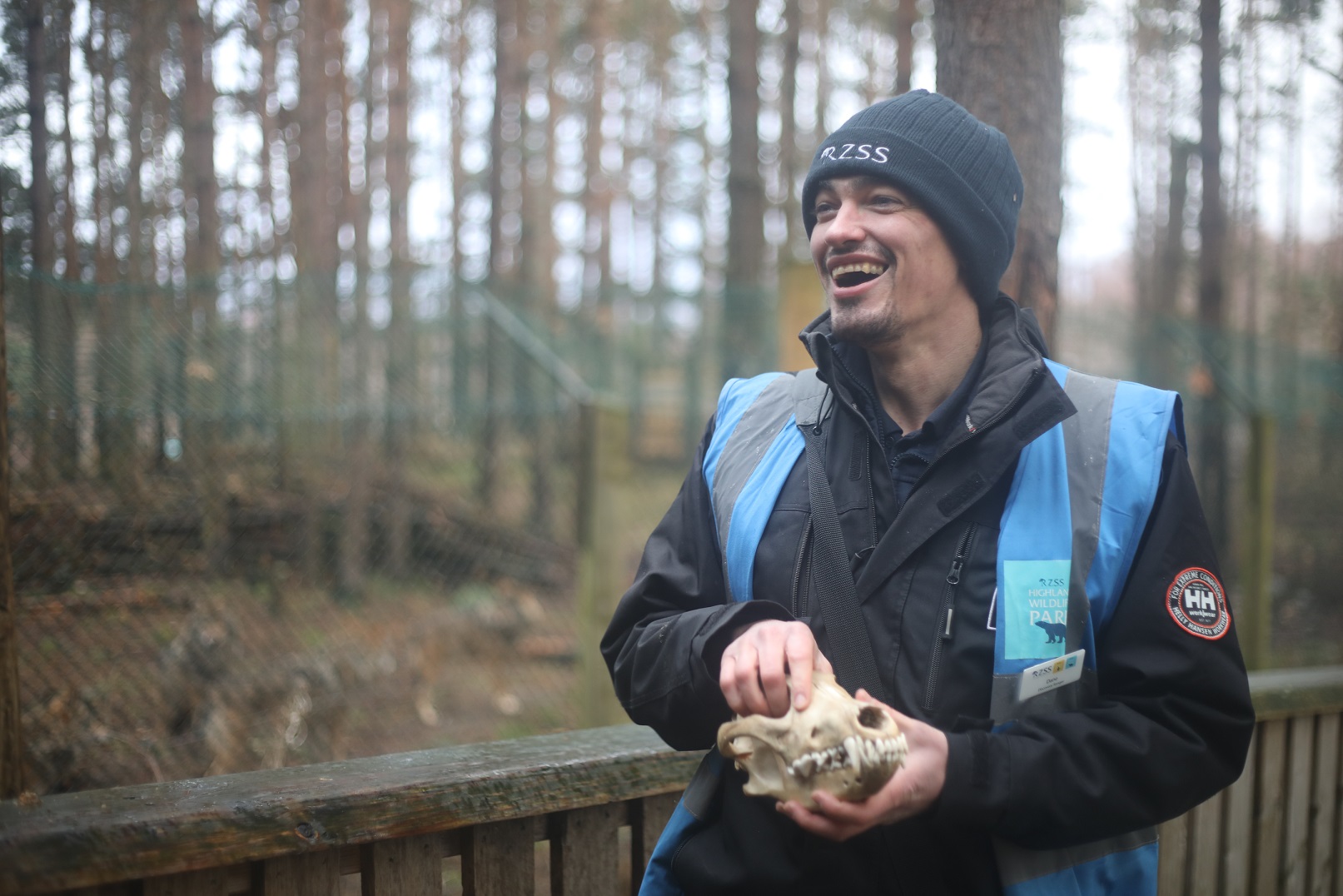 Ranger Dane giving a talk looking to the left and holding a prop IMAGE: Allie McGregor 2023