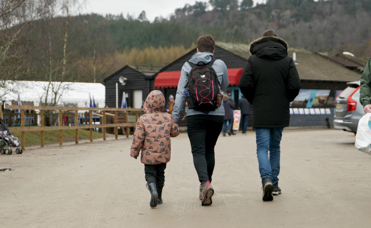 Family walk through car park IMAGE: FoSho 2023